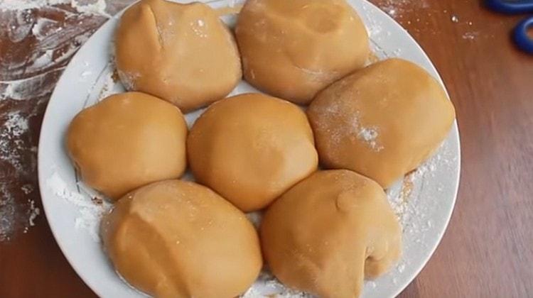 We roll the pieces of dough into balls and send these balls to the refrigerator.