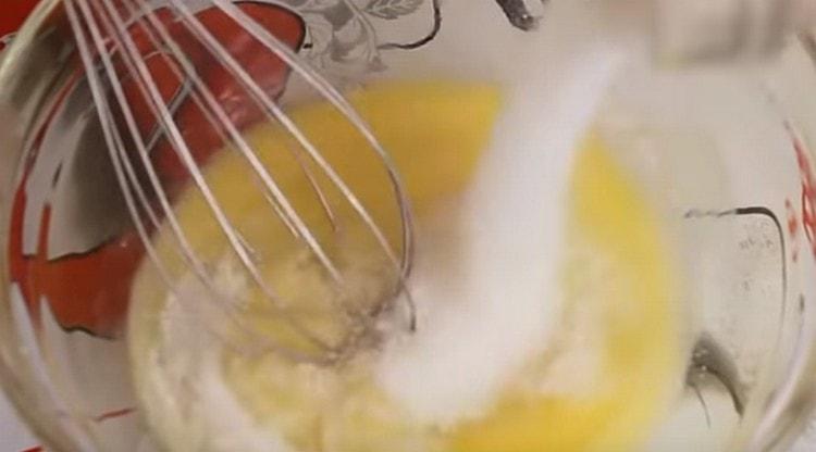 Beat eggs with sugar separately.