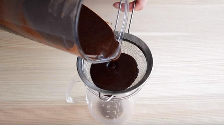 To get rid of air bubbles, we pass the glaze through a sieve.