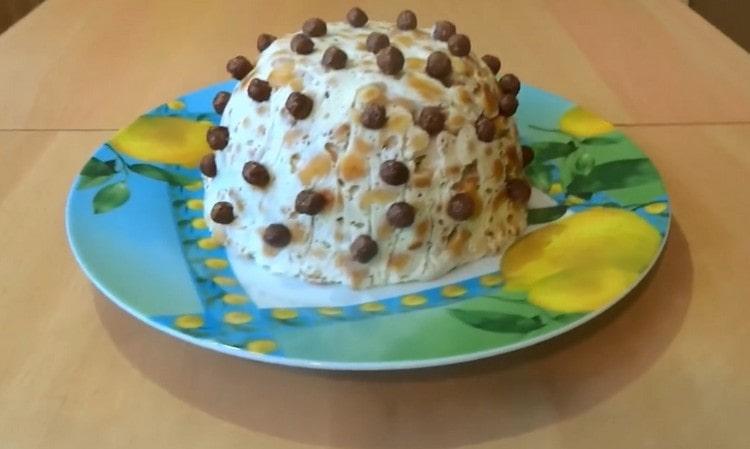 Such a cake without baking from cookies and sour cream will be a great addition to your tea party.