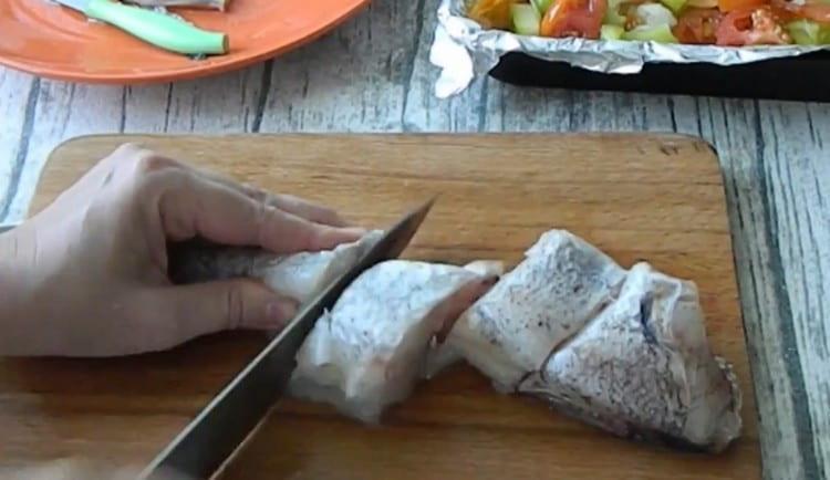 Cut the fish into portions.