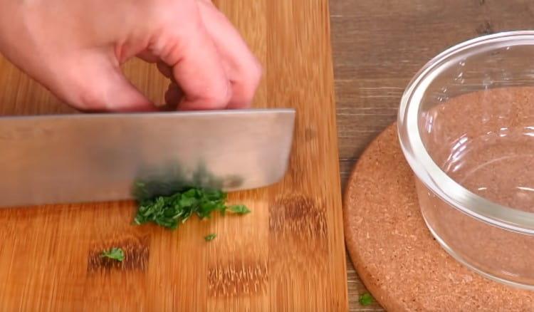 Grind a sprig of mint.