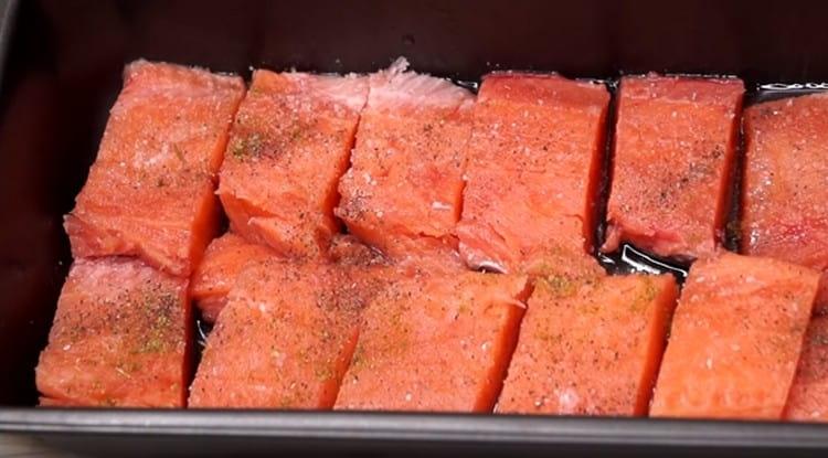 Salt, pepper the fish to taste.