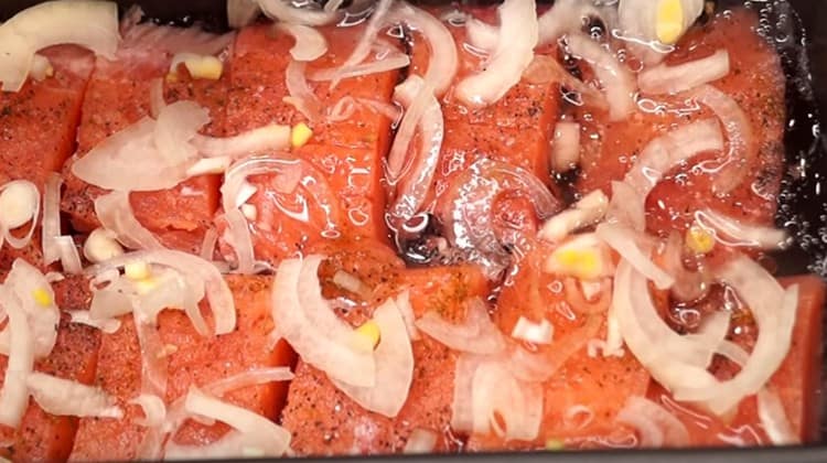 Add some water and send the fish to the oven.