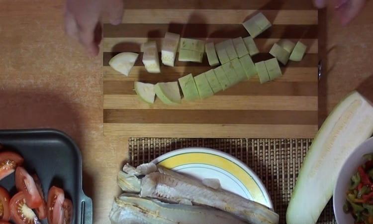 Cut into large cubes of zucchini.