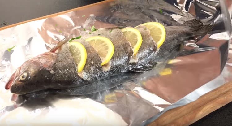 We spread the fish on two layers of foil.