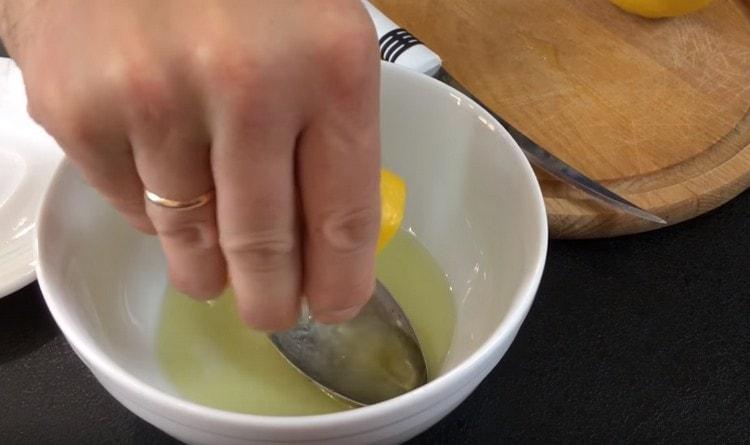 Add lemon juice to olive oil.