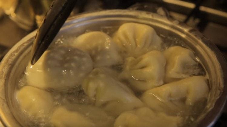 When khinkali pop up, you can get them with a slotted spoon.