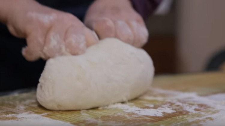 Knead the dough until it becomes smooth.