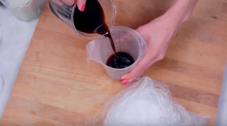 Pour coffee into the blender's container.