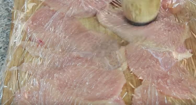 Chicken fillet cut in half across and beat off.