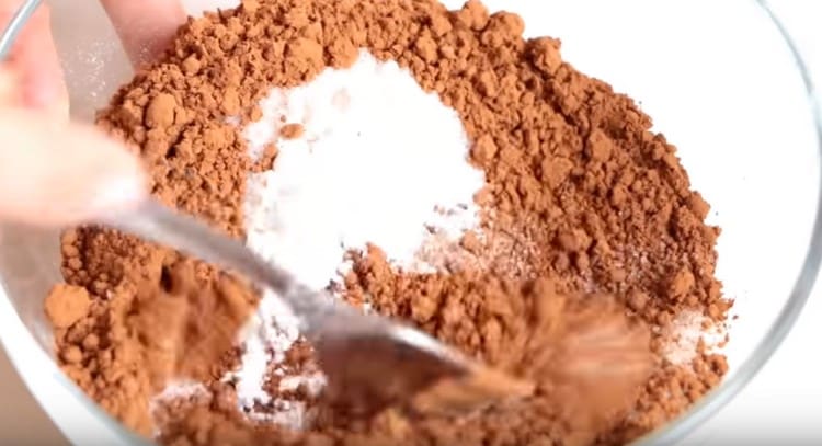 Add sugar and vanilla sugar and mix the dry ingredients.