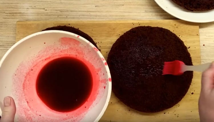 Soak all the cakes with cherry juice.