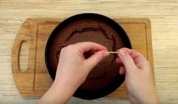 Check the readiness of the biscuit with a toothpick.