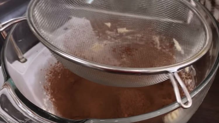 Then combine the whipped condensed milk and butter and add cocoa to them.