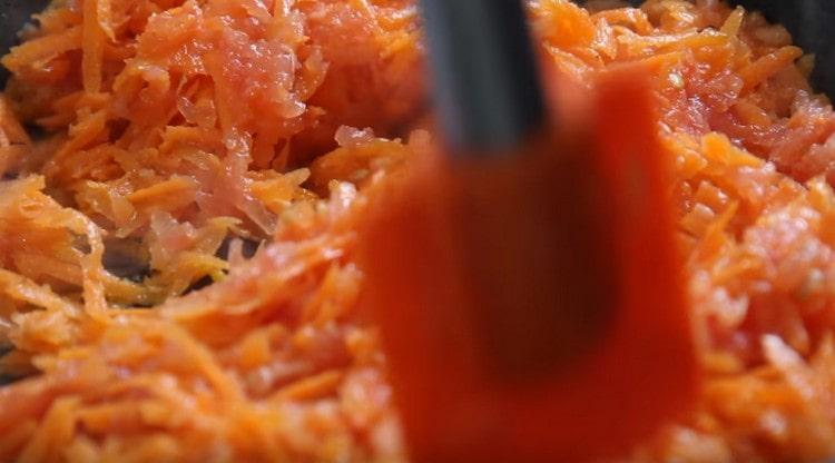 Add the tomatoes with garlic.