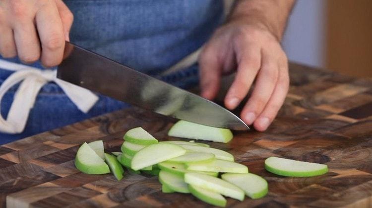 Cut apples into thin slices.