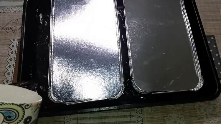 To make chicken ham at home, preheat the oven