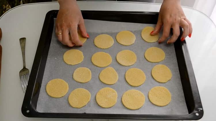 To make biscuit cookies, preheat the oven