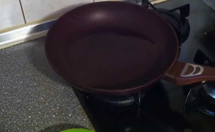 To cook fried fish, heat the pan