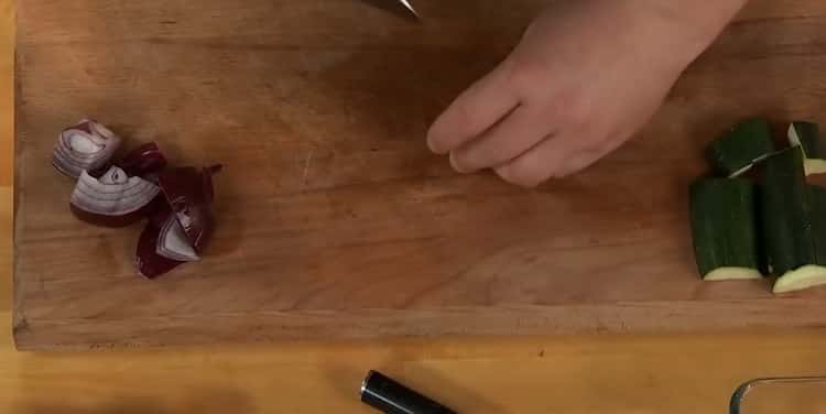 To cook chicken roast with potatoes, chop zucchini