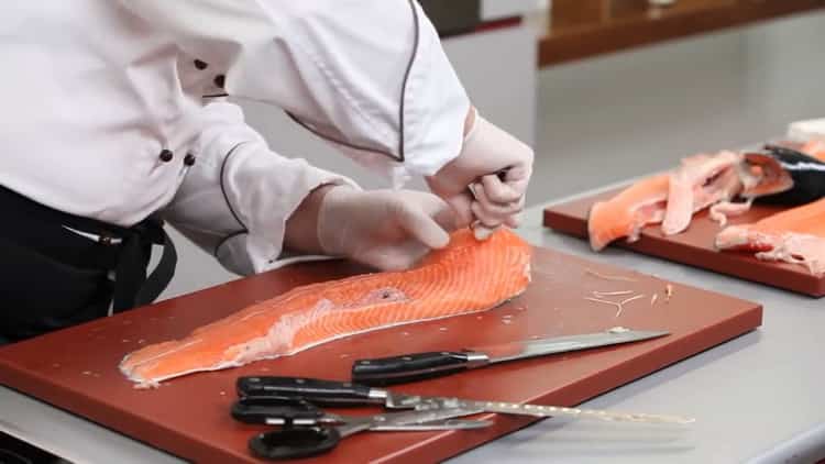 take out the bones from the fish