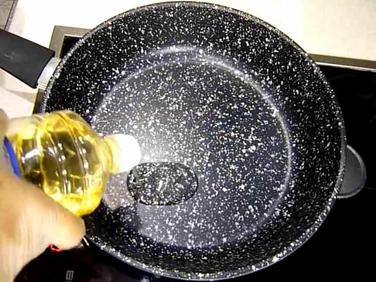 To make fried crucian, heat the pan