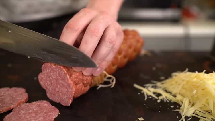 To make a classic pizza, chop the sausage