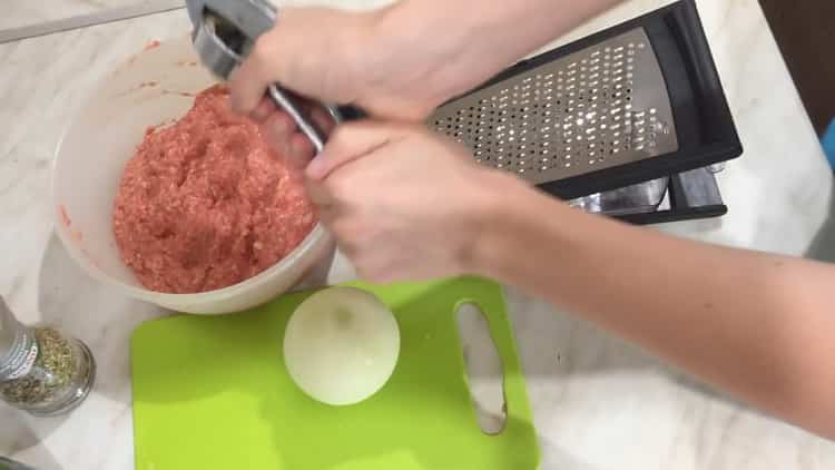 To cook ground beef patties, grate the garlic