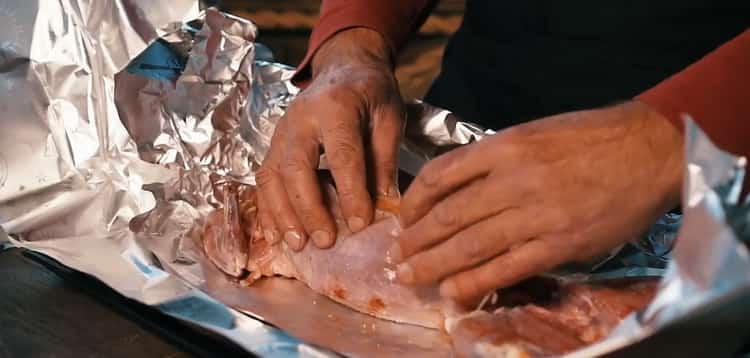 To cook the whole rabbit in the oven. put the fruit in the meat