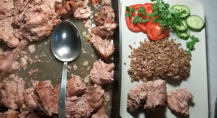 Oven-baked tender rabbit in sour cream