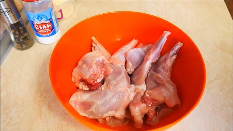 How to cook a rabbit in sour cream in the oven with potatoes
