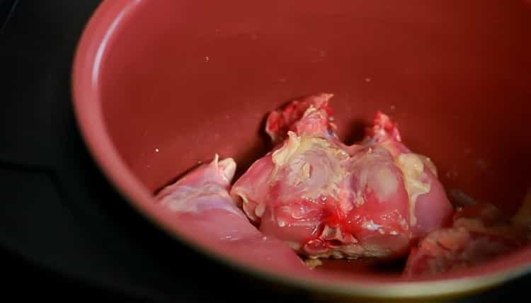 To cook a rabbit with potatoes in a slow cooker, prepare the ingredients