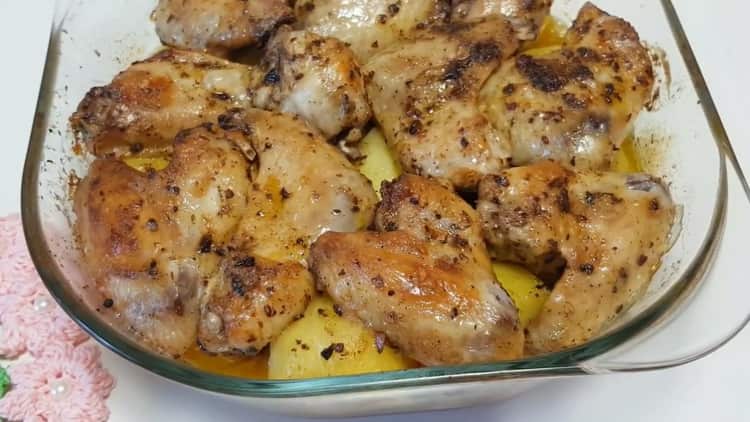 in the oven chicken wings with potatoes are ready