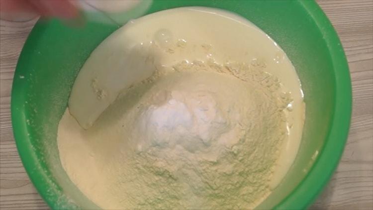 According to the recipe for cooking chicken with potatoes, combine the ingredients for the dough.