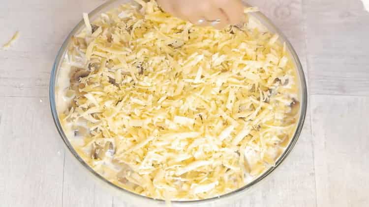 To prepare a pie with chicken and mushrooms, grate cheese