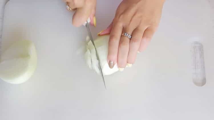 For onion pie with chicken and mushrooms, chop onion