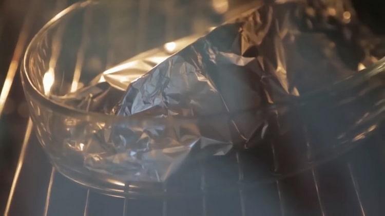 To cook salmon in the oven in a foil bake fish