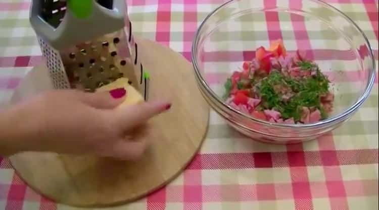 To make a mini pizza on a loaf, chop the cheese