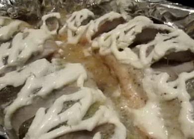 Navaga in the oven according to a step by step recipe with a photo