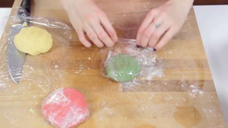 To make Christmas cookies, put the dough in a film