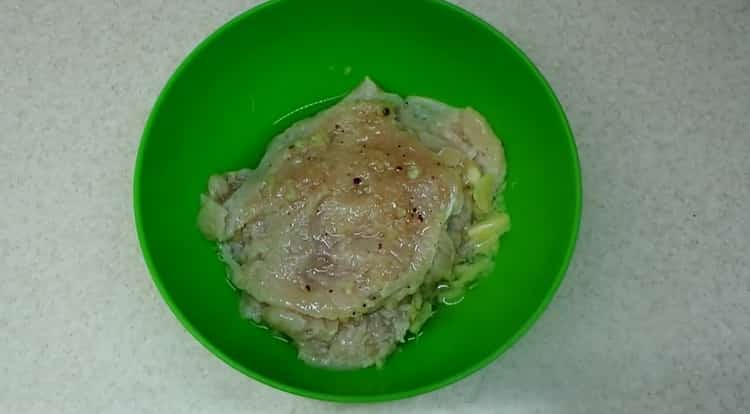 To cook chicken breast chop, marinate the meat