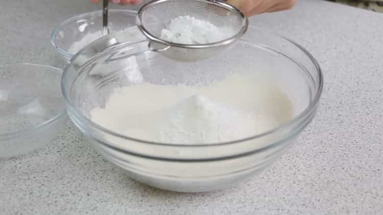Cooking an open pie with cottage cheese.
