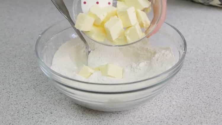 To make an open pie with cottage cheese, mix flour and butter