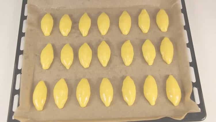 To make cookies in the oven, preheat the oven