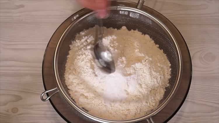 According to the recipe for making homemade cookies, sift the flour