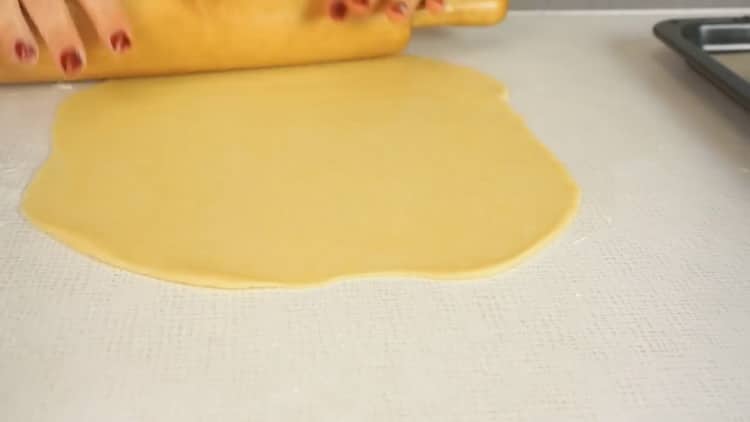 Roll dough to make bagels