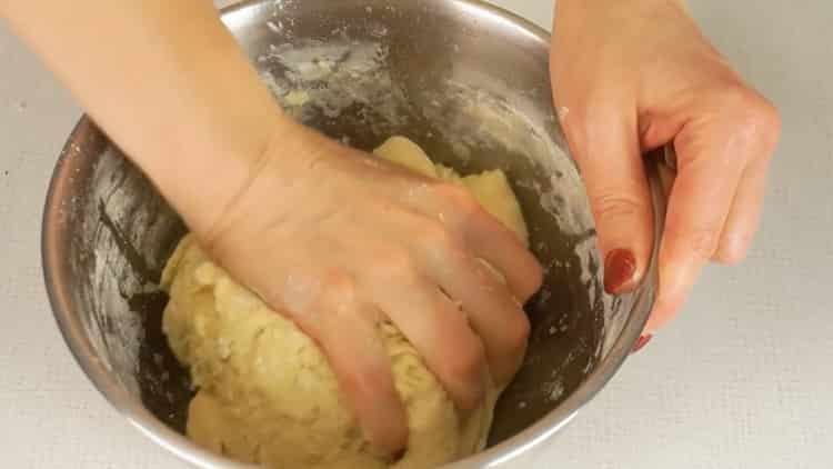 Knead the dough to make bagels