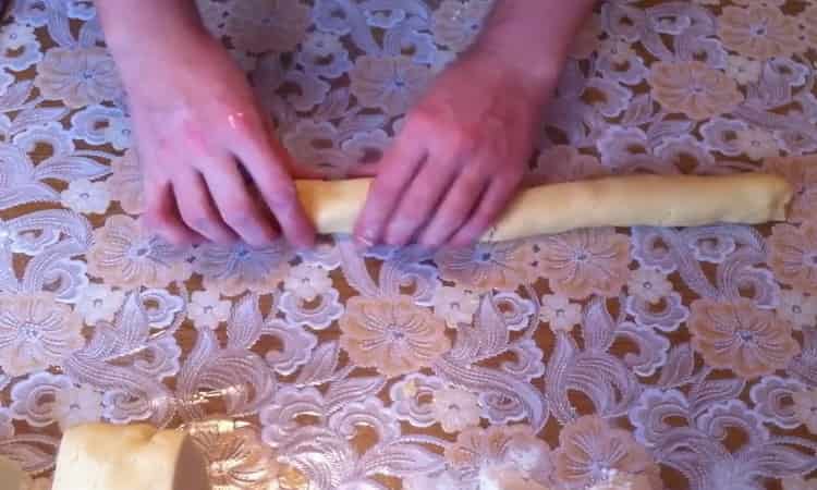 Roll out the dough to make melting cookies.