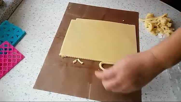 To make anniversary cookies, cut the dough